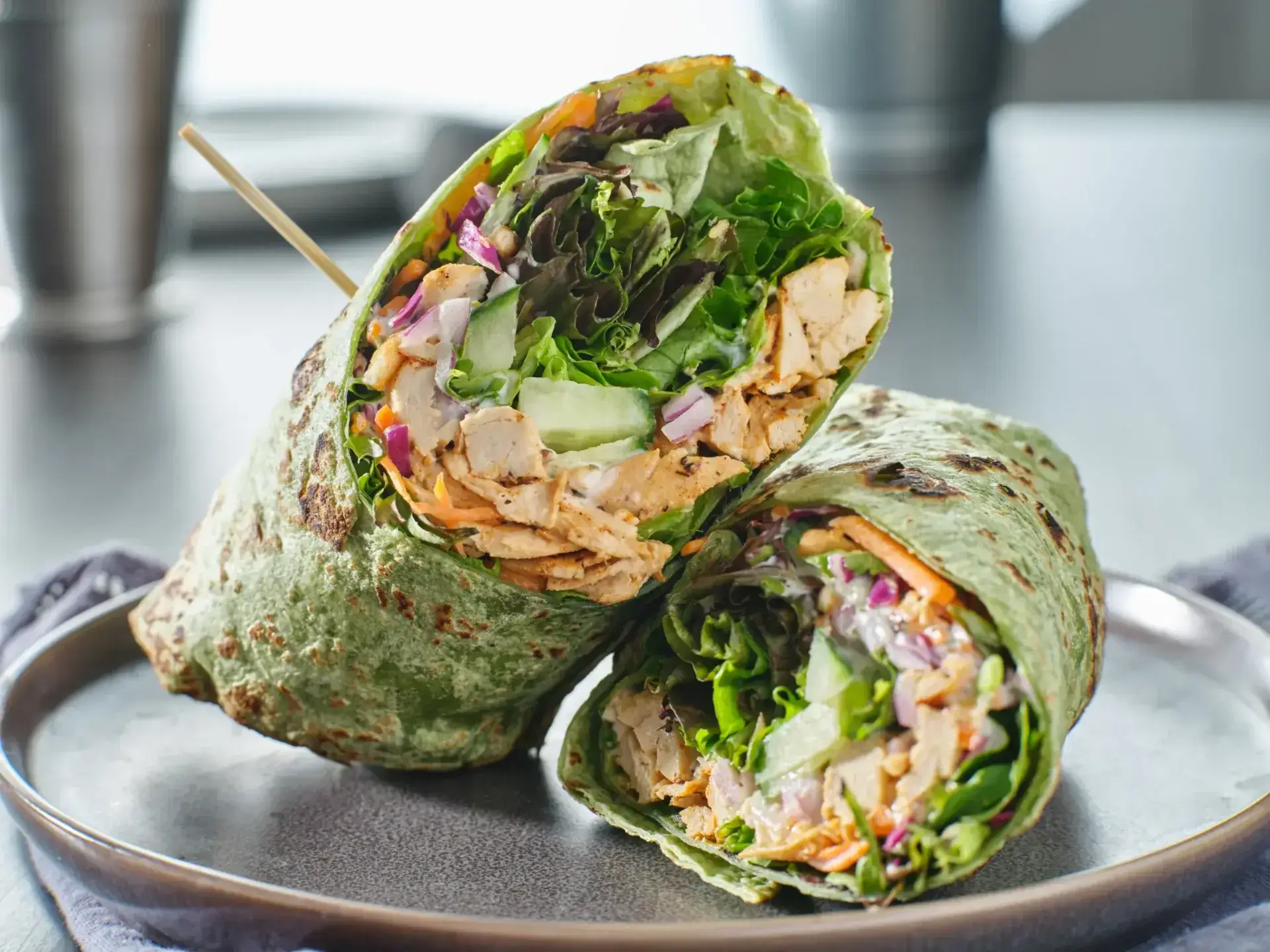 Healthy green lettuce and chicken salad wrap.