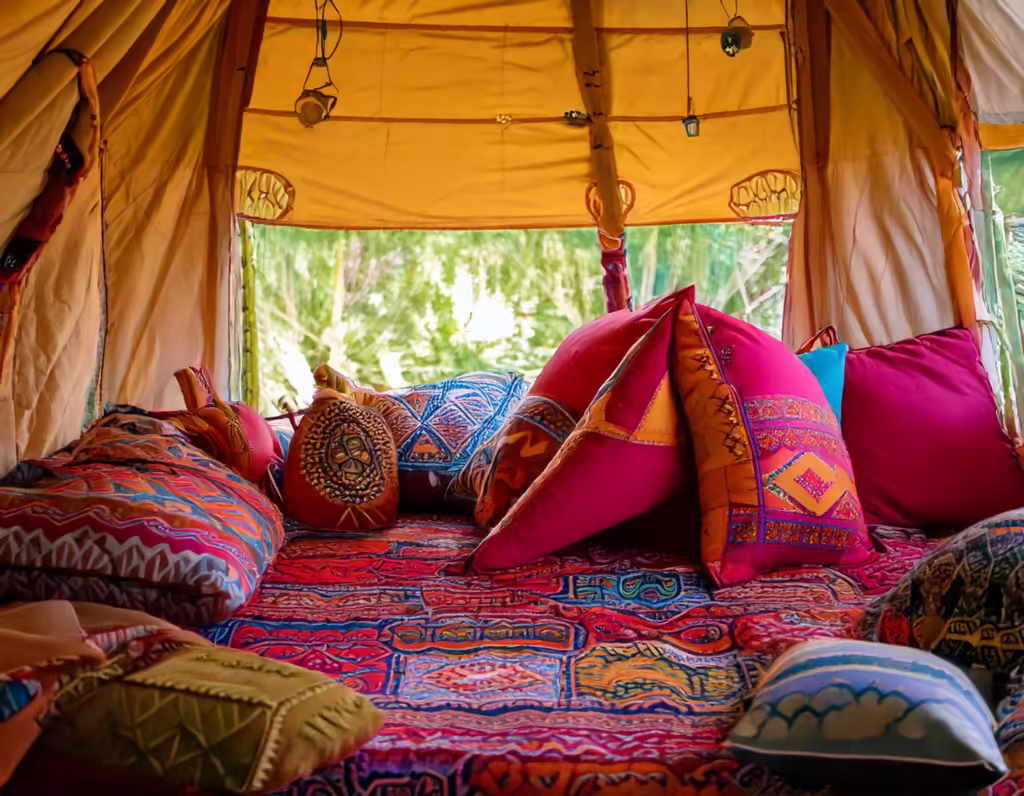 Firefly A delightful assortment of vibrant colorful pillows is artfully arranged on a cozy bed insi