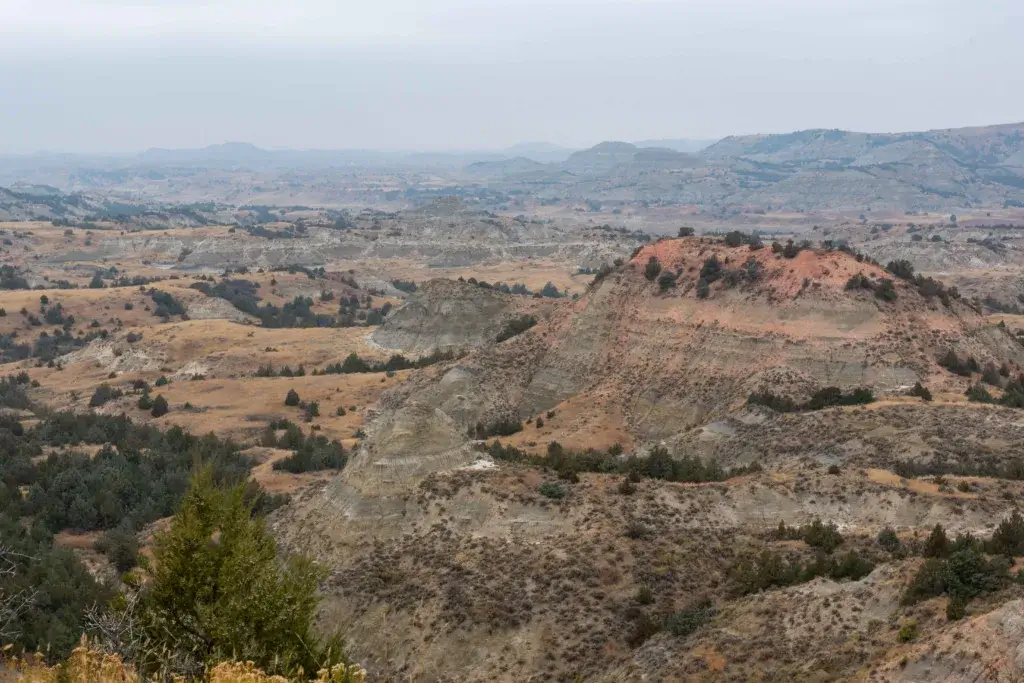The Badlands National Park in South Dakota on a foggy day.