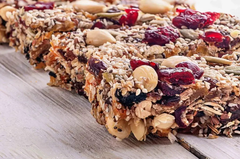 Trail mix bars made from oats with cranberries.
