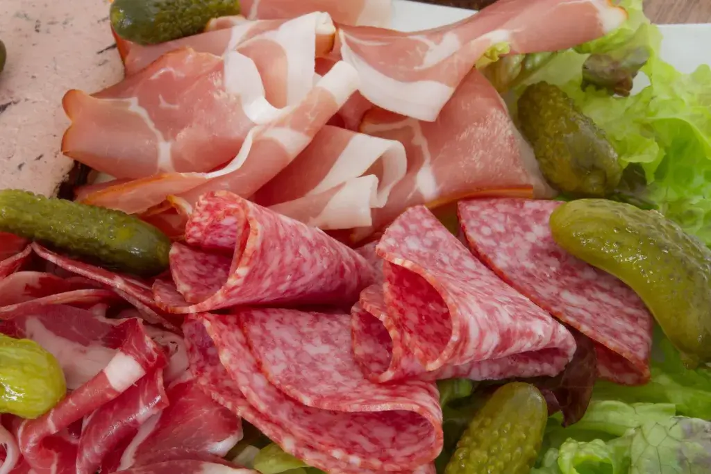 Summer sausage and pickles.