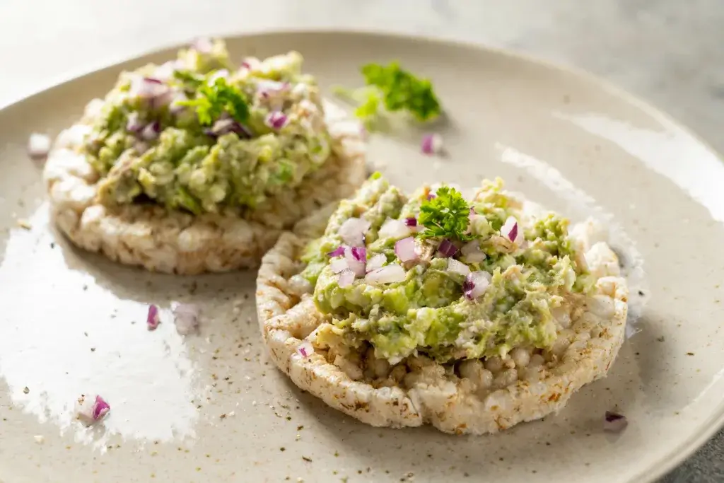 Tuna salad on rice crackers.