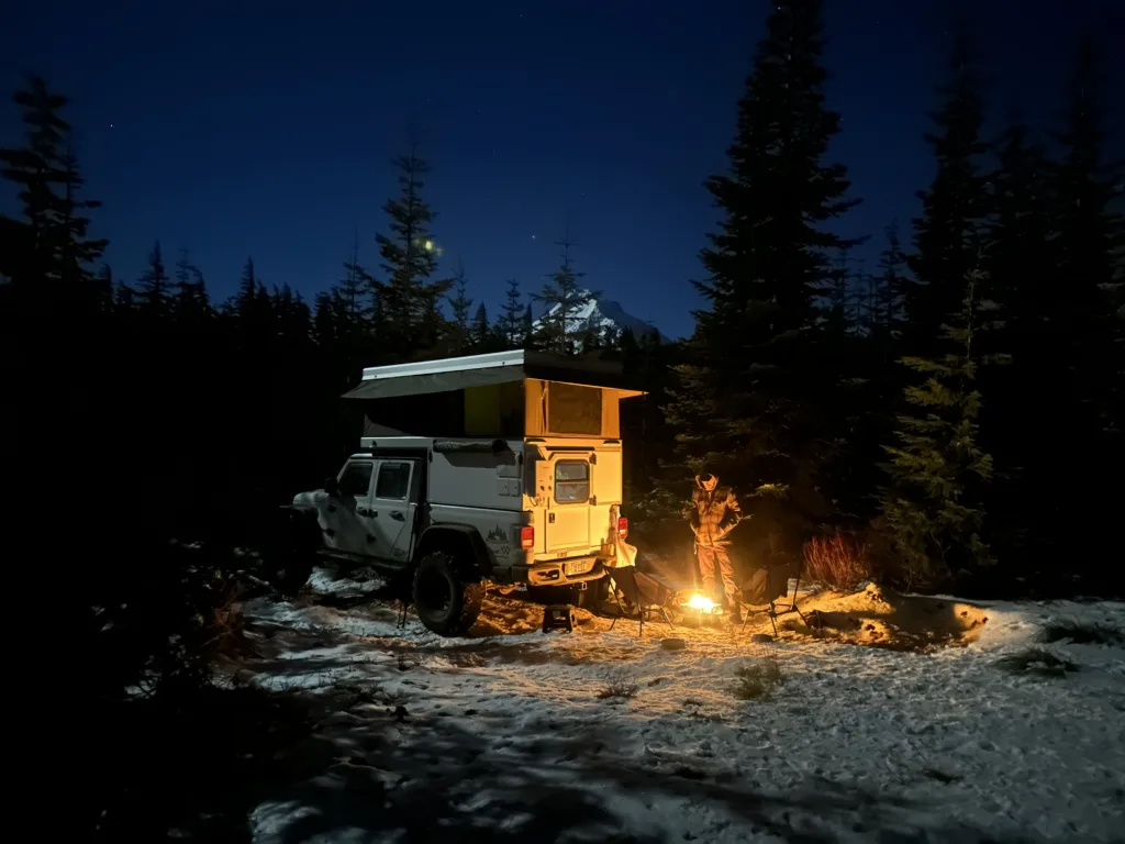 Jeep Gladiator and a campfire with Mt Hood in the background.