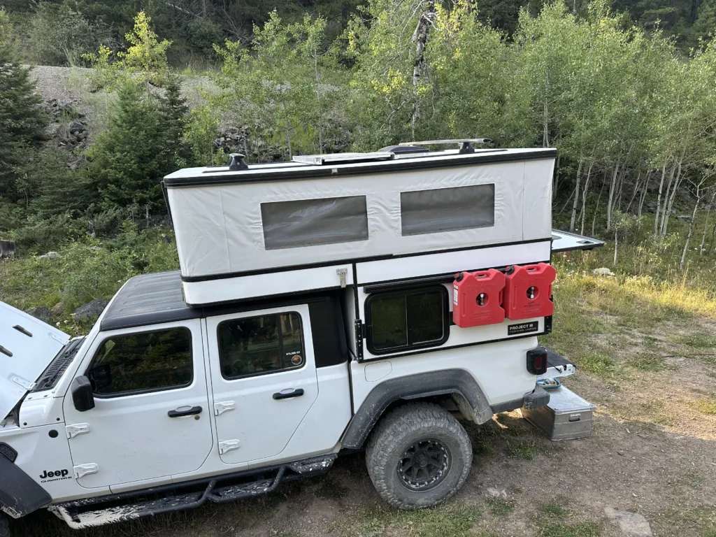Jeep Gladiator with solar panels on roof.