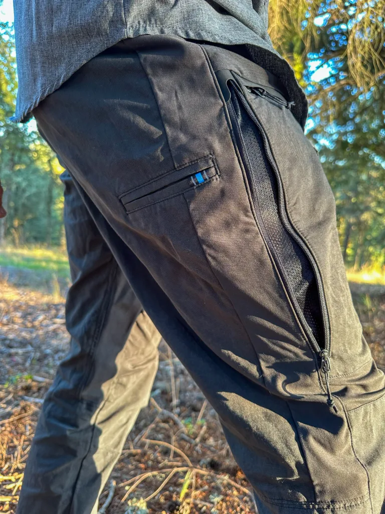 Man wearing KUHL RADIKL Outsider pants showing off venting.