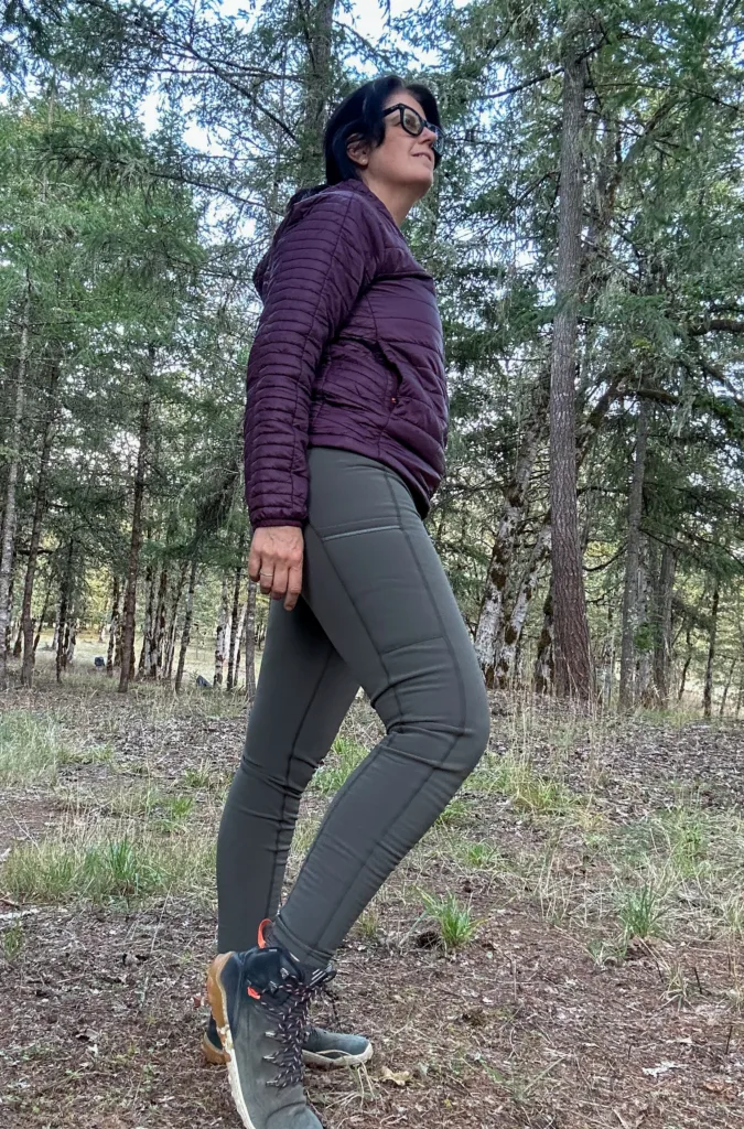 Woman wearing KUHL Frostbite pants.