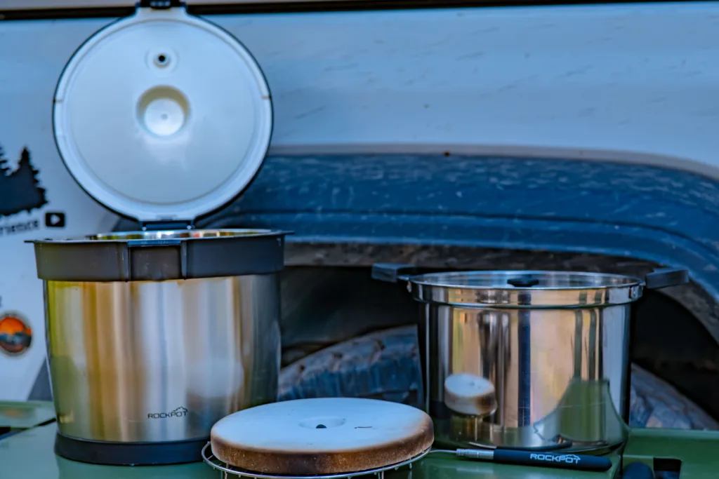 RockPot and stone sitting on a camp kitchen.